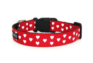 Back side of the Be My Valentine Dog Collar in red, displaying the pattern repeating itself along the length of the collar