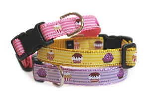 The Cupcakes Dog Collar, shown in three color options, pink, yellow, and purple, with cute cupcakes repeating down the length of the collar.