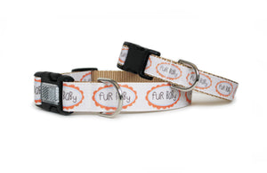 The Fur Baby Dog Collar in cream with the text, Fur Baby, in a playful font surrounded by a cute scalloped border in orange, and an optional engraved reflective buckle, shown with a small size collar.