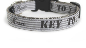 Elegant Dog Collar in light gray with petite gray and light gray stripes with the text, Key to My Heart.