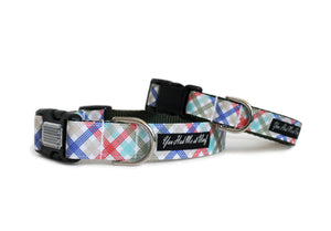 Plaid Preppy Dog Collar in crisp blue, green and red atop a white backdrop.