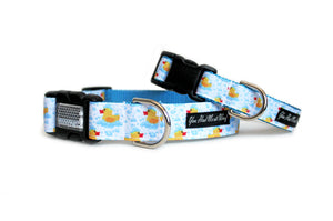 The Rubber Ducks Dog Collar with cute yellow rubber ducks floating in light blue bubbles.